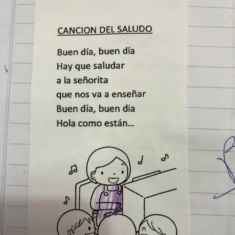 A printed greeting song, Canción del saludo, with a line drawing of children around a piano.